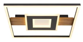 Pikara 38cm Trä plafond från Globo Lighting - Lampan &auml;r tillverkad i en stilfull kombination av metall i tr&auml;look och en mattsvart finish, vilket ger den en modern men samtidigt naturlig k&auml;nsla.