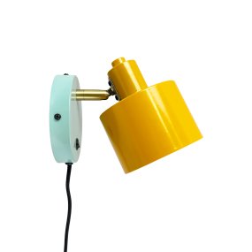 Ocean 16cm Flerfärgad från Dyberg Larsen - St&aring;ng och arm i handpolerad m&auml;ssingfinish vilket ger ett unikt uttryck, och den genomt&auml;nkta f&auml;rgs&auml;ttningen skapar en harmonisk helhet.