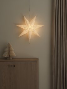 Pappersstjärna m. brodyr Ø60 Vit från Konstsmide - Stj&auml;rnan har sju spetsiga uddar och ett dekorativt spetsm&ouml;nster som ger ett elegant och detaljrikt uttryck.