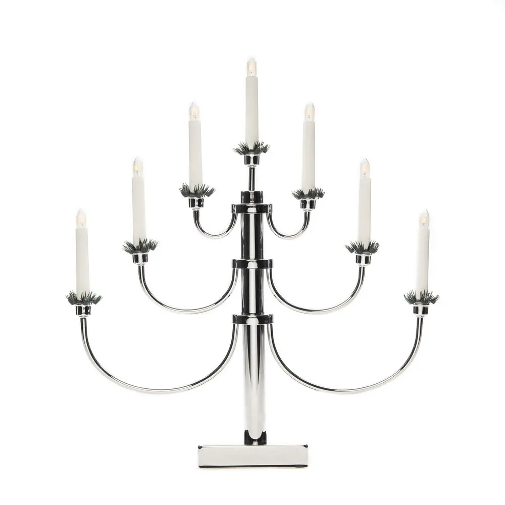 Elljusstake 7ljus Krom från Konstsmide - Den klassiska designen med sina sju ljus och dekorativa detaljer ger en tidl&ouml;s och lyxig k&auml;nsla.