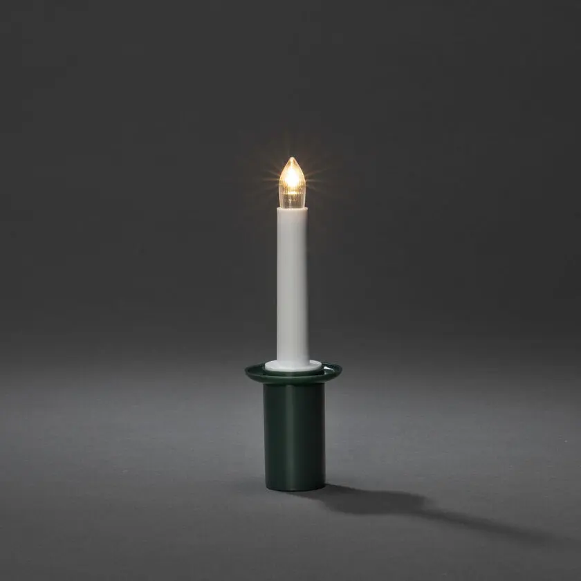 Tärnljus Grön från Konstsmide - Elegant t&auml;rnljus med gr&ouml;n h&aring;llare och LED-ljus som sprider ett mjukt, varmvitt sken.