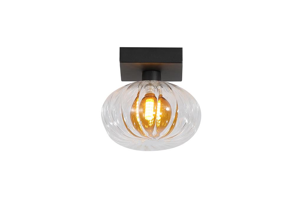 Sunbeam Ø14 Transparent/svart vägglampa från Searchlight - Den runda, ribbade sk&auml;rmen i transparent glas har en vackert b&auml;rnstensf&auml;rgad kupa inuti som skapar liv och struktur, samtidigt som ljuset sprids mjukt och behagligt i rummet.