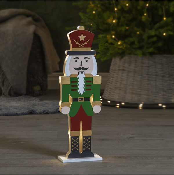 Nutcracker 52cm Flerfärgad från Star Trading - Sm&aring; ledlampor lyser mellan de tv&aring; figurs&aring;gade siluetterna, en fram och en baksida.