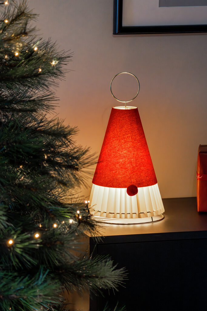 Papperstome Röd från Konstsmide - Ger ett mjukt och varmt sken som f&ouml;rgyller hemmet under advent och jul.