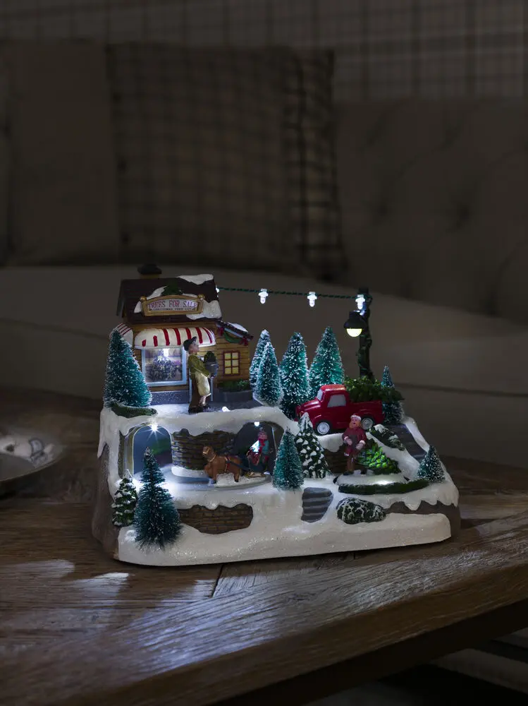 Mekanisk juldekoration granförsäljning 17cm Flerfärgad från Konstsmide - Skapa en livfull julst&auml;mning med denna mekaniska juldekoration &ndash; en charmig scen med granf&ouml;rs&auml;ljning i vinterskrud.