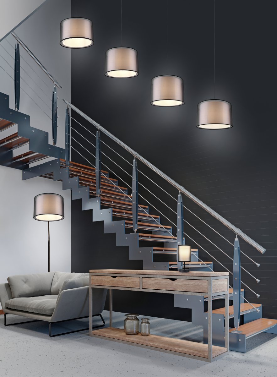 Burton Svart golvlampa från Trio Lighting - Den moderna kombinationen av en inre vit tygsk&auml;rm och en yttre transparent svart plastsk&auml;rm ser b&aring;de individuell och uppfriskande ut och kan integreras i moderna livsstilar p&aring; m&aring;nga s&auml;tt.