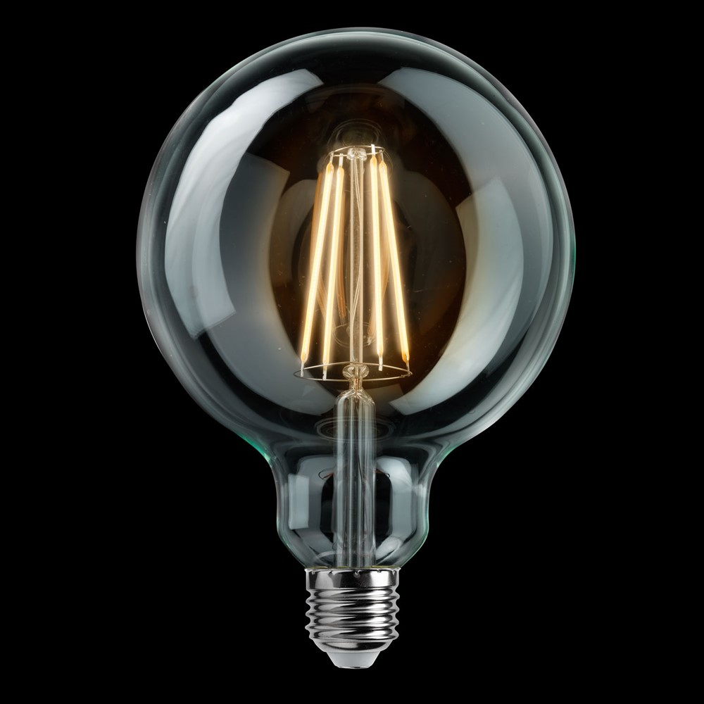 E27 7W 2200K 3-steg dimbar minne Transparent från Unison - Glob 125mm klar E27-ljusk&auml;lla med en effekt p&aring; 7W och ett varmt ljus p&aring; 2200K &auml;r perfekt f&ouml;r att skapa en st&auml;mningsfull och behaglig atmosf&auml;r.
