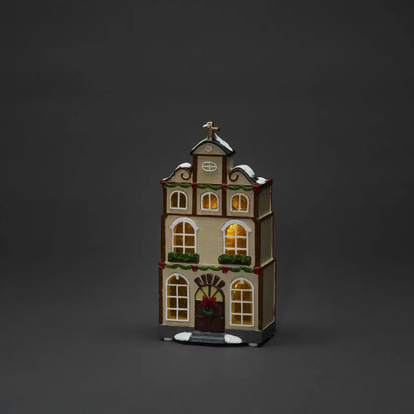 3 små hus Flerfärgad från Konstsmide - B/O 3 sm&aring; hus, vintriga hus med 14 amberf&auml;rgade och varmvita LED-ljus som sprider ett st&auml;mningsfullt sken.