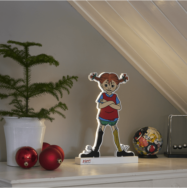 Pippi Flerfärgad barnlampa från Star Trading - En klassisk illustration av Pippi, h&auml;r i form av en siluett som lyser ut fr&aring;n sidorna.