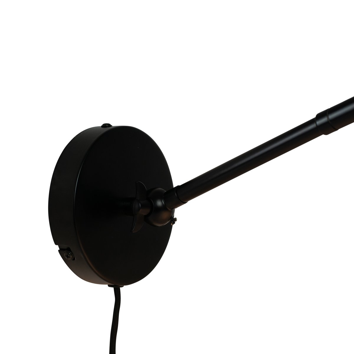 Futura 43cm Svart vägglampa från Dyberg Larsen - Tillverkad i metall med en svart utsida och vit insida, skapar den en minimalistisk look.