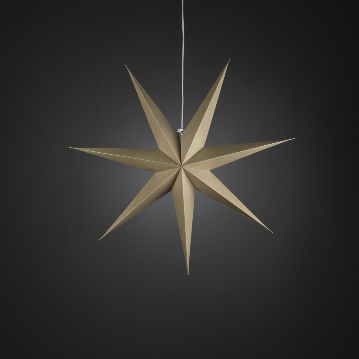 Pappersstjärna Ø78 Beige från Konstsmide - Den enkla, eleganta designen sprider ett mjukt och behagligt ljus som ger en harmonisk k&auml;nsla under advent och jul.