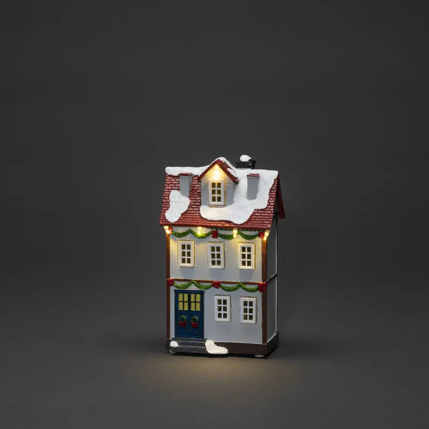 3 små hus Flerfärgad från Konstsmide - B/O 3 sm&aring; hus, vintriga hus med 14 amberf&auml;rgade och varmvita LED-ljus som sprider ett st&auml;mningsfullt sken.