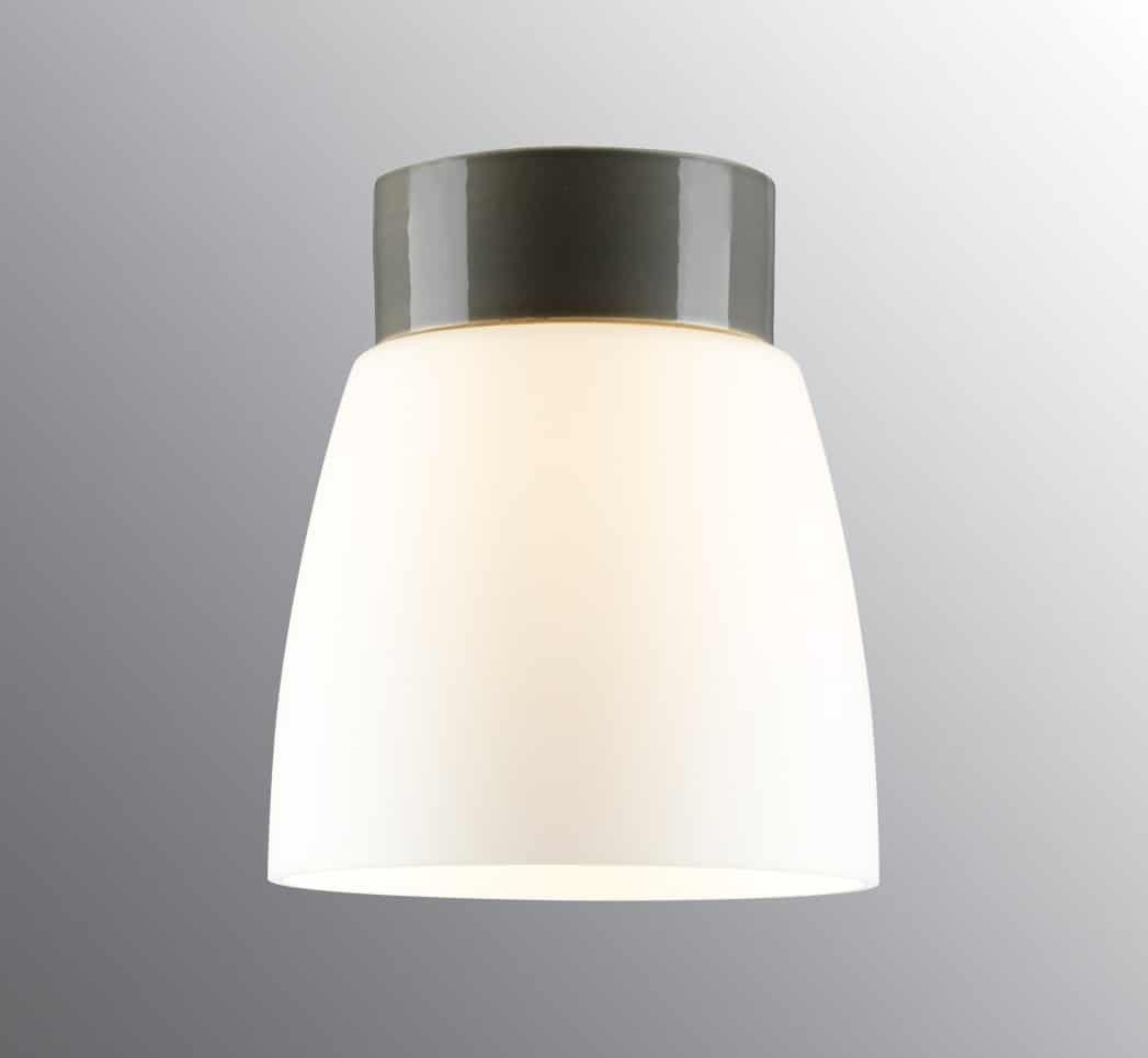 Open Klara Ø15 Grå badrumslampa från Ifö electric - Plafondens robusta material i porslin och diffusa opalglas ger en sofistikerad touch till ditt hem, samtidigt som den sm&auml;lter in i olika inredningsstilar.
