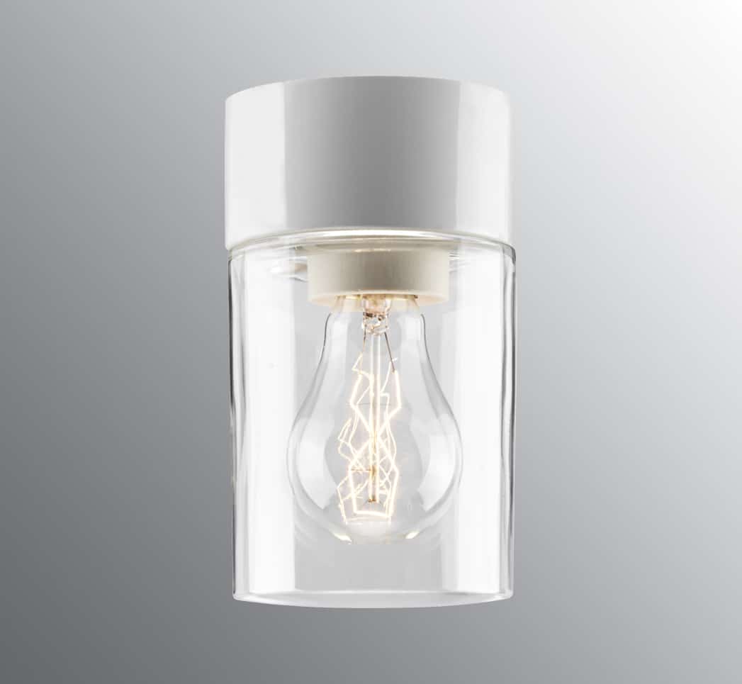 Opus 100/175 Vit badrumslampa från Ifö electric - Med sin genomskinliga glaskupa och vita detaljer l&aring;ter den ljusk&auml;llan st&aring; i centrum, vilket skapar ett unikt och st&auml;mningsfullt sken.