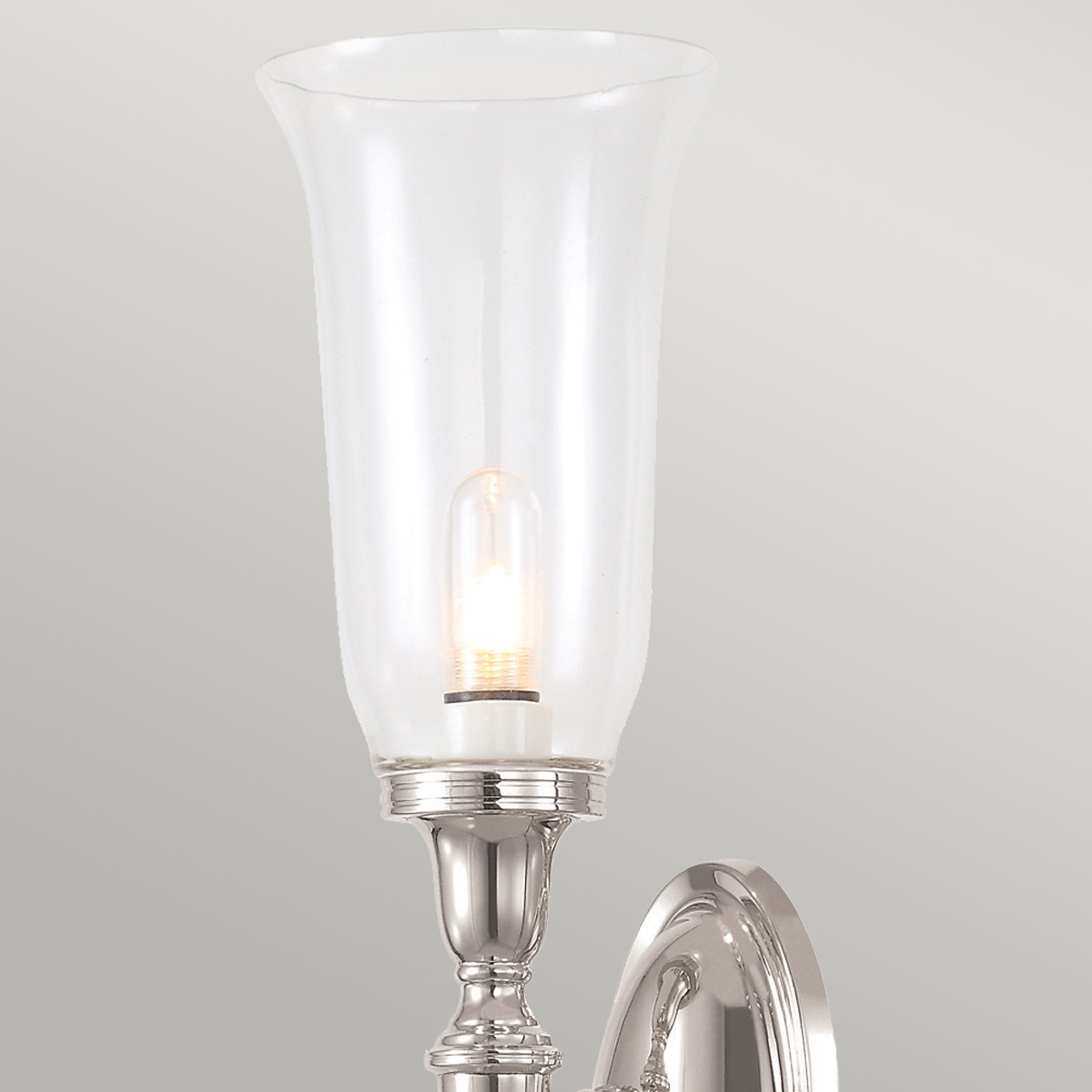 Dryden 40cm Polerad nickel badrumslampa från Elstead Lighting - Lampan finns i flera utf&ouml;randen som polerad krom, polerad nickel och polerad m&auml;ssing, vilket ger flexibilitet i stil och inredning.