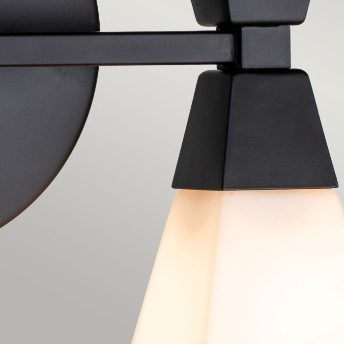 Bowtie 34cm Svart badrumslampa från Elstead Lighting - Den mattsvarta Bowtie v&auml;gglampan &auml;r en modern spegelbelysning med IP44-klassning, vilket g&ouml;r den l&auml;mplig f&ouml;r badrum men &auml;ven f&ouml;r andra interi&ouml;rer som tv&auml;ttstuga eller g&auml;sttoalett.