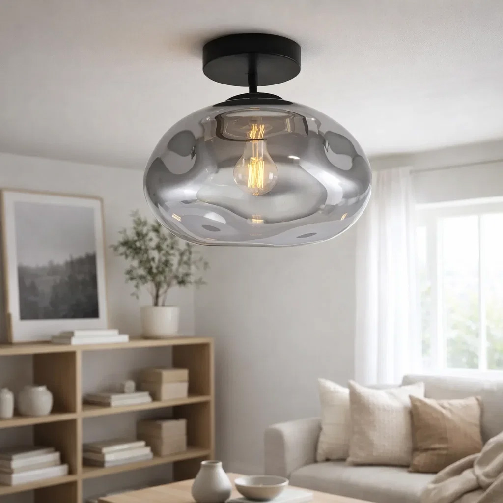 Iformo Ø35 Svart/Rökfärgad plafond från Nordic Lighting - Iformo &auml;r en stilren plafond som ger rummet ett mjukt och varmt ljus.