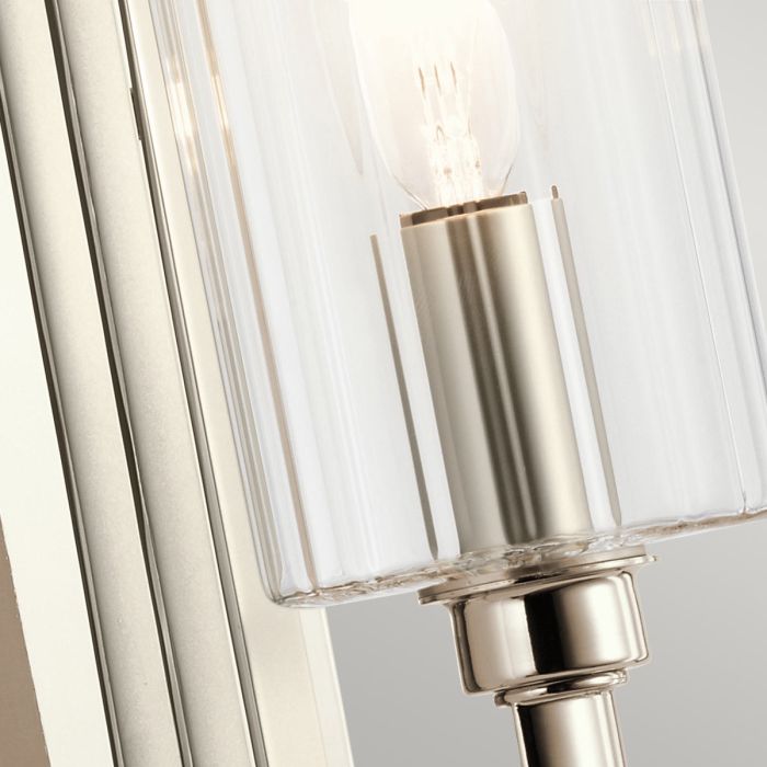 Kimrose 35cm Nickel vägglampa från Elstead Lighting - Dess geometriska former st&aring;r i fokus och f&ouml;rst&auml;rks av en elegant finish i polerad nickel.