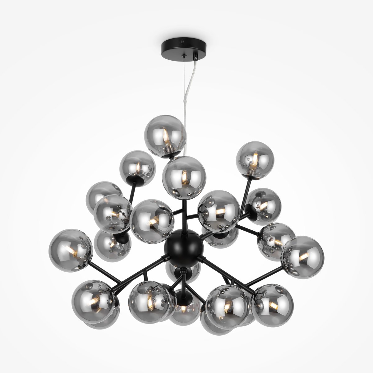 Dallas Ø65 Svart taklampa från Maytoni - Dess unika design med runda glaskupor i olika riktningar skapar ett dramatiskt och elegant ljusspel som fyller rummet med v&auml;rme och karakt&auml;r.